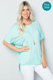 WOMAN WEARING PLUS SIZE OPEN BACK SHIRT