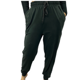 Woman wearing black jogging pants that feel like leggings