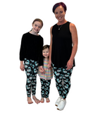 FAMILY WEARING MATCHING DISNEY LEGGINGS