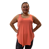 WOMAN WEARING PLUS SIZE CORAL TANK TOP