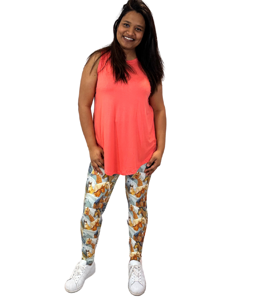 WOMAN WEARING PLUS SIZE LEGGINGS WITH HORSES