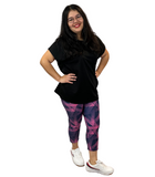 WOMAN WEARING PLUS SIZE NAVY AND PINK CAPRIS
