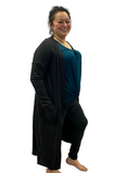 Woman wearing curvy black yoga leggings