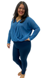 Woman wearing extra curvy navy leggings