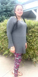 Woman wearing extra plus cancer leggings
