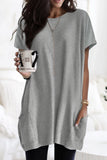 WOMAN WEARING PLUS SIZE GRAY TUNIC WITH POCKETS
