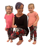 Mom and daughter wearing matching leggings