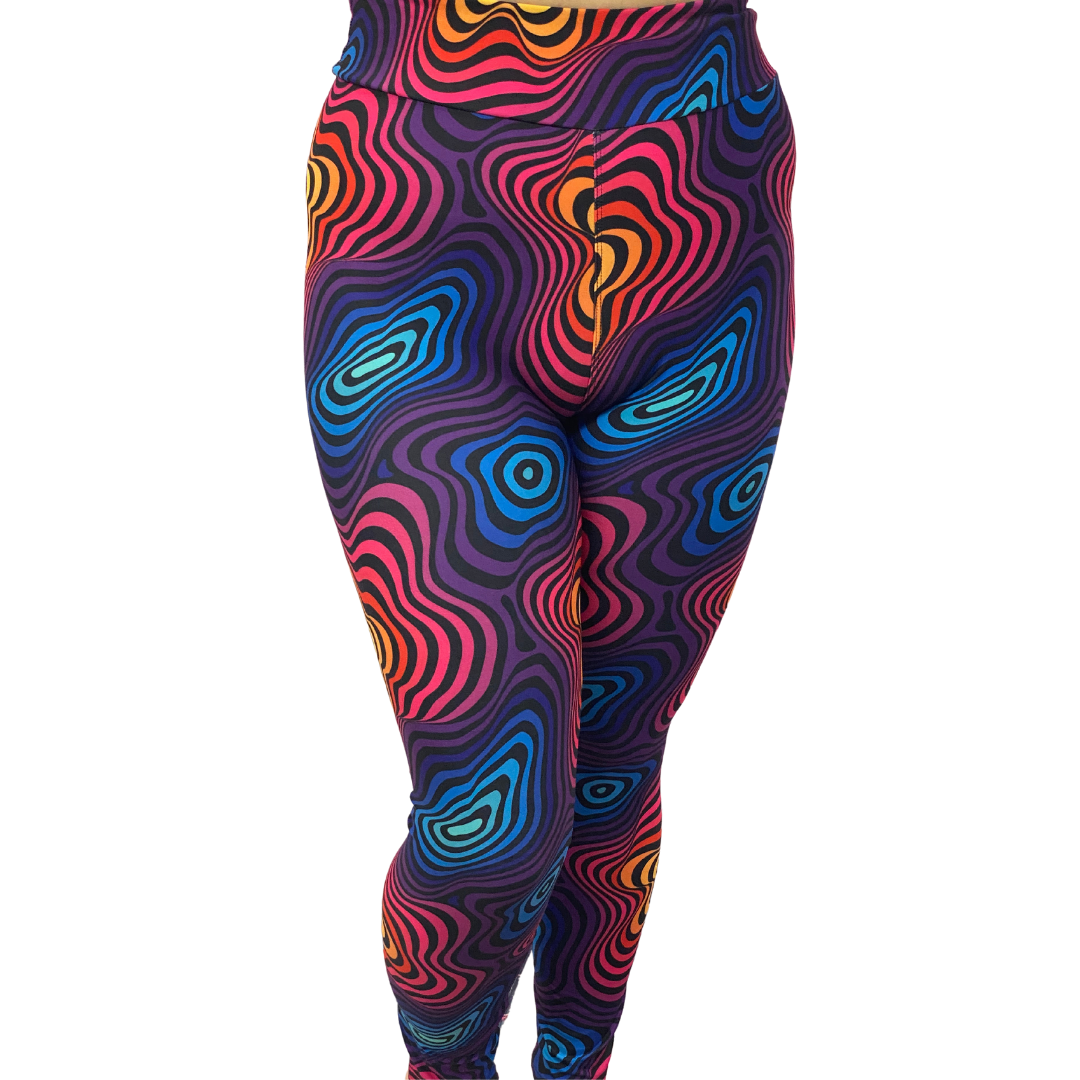 WOMAN WEARING EXTRA PLUS COLOURFUL LEGGINGS