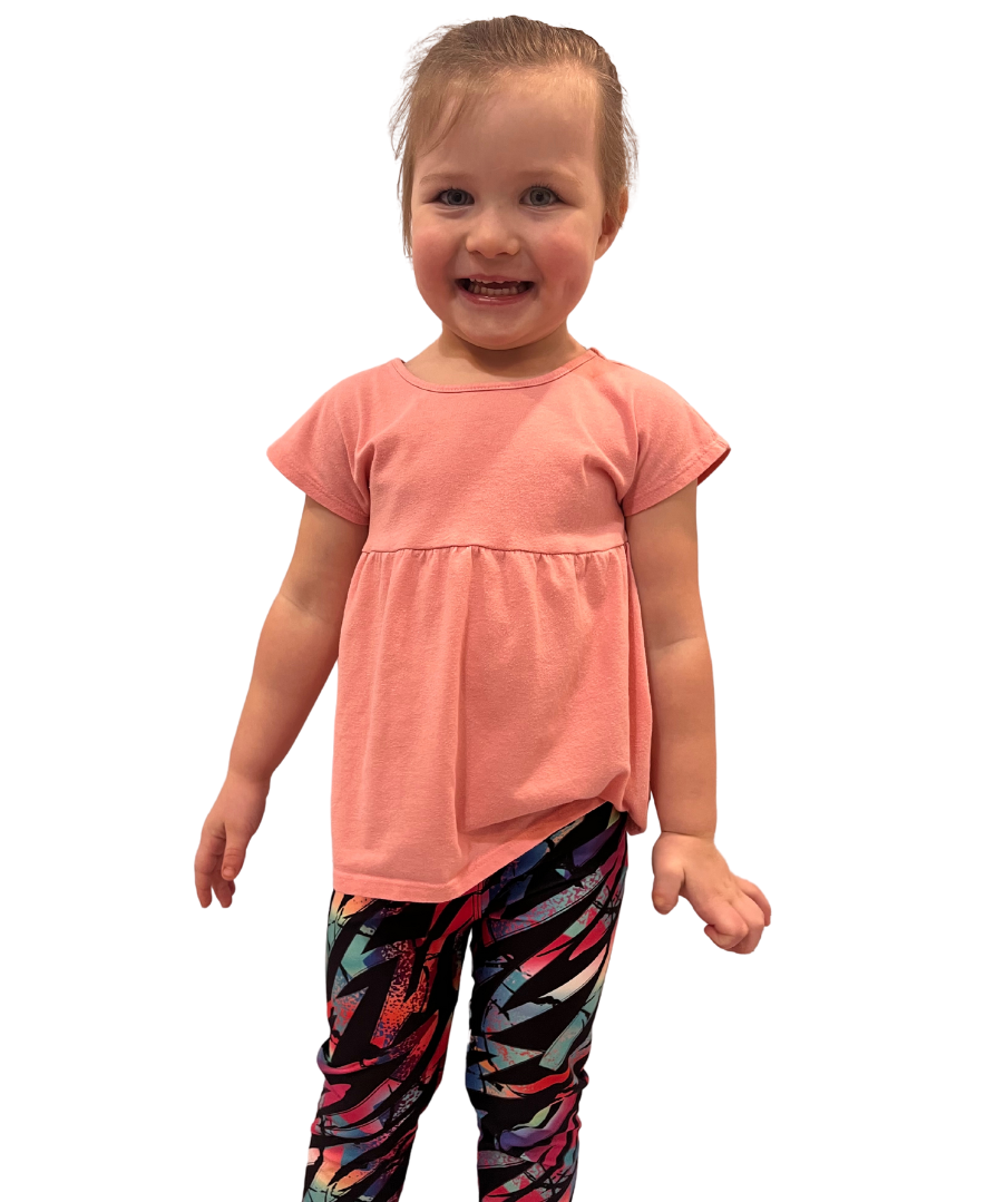 Toddler wearing colourful leggings