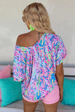 WOMAN WEARING A BRIGHT OFF THE SHOULDER SHIRT