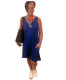 WOMAN WEARING SLEEVELESS ROYAL BLUE DRESS