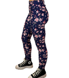 WOMAN WEARING PINK FLORAL LEGGINGS