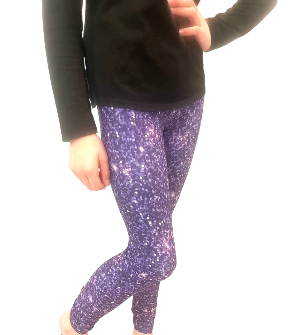 TODDLER WEARING MATCHING MOMMY AND ME PURPLE LEGGINGS