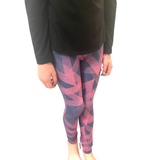 TWEEN WEARING PINK PLAID LEGGINGS