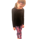 TWEEN WEARING NAVY AND PINK LEGGINGS