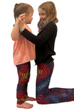 Sisters wearing matching leggings