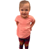Toddler wearing holographic leggings