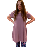 WOMAN WEARING A PLUS SIZE COLD SHOULDER LAVENDAR SHIRT