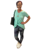 WOMAN WEARING MINT CUTOUT SHOULDER TOP