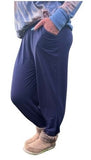 Woman wearing plus size navy jogging pants