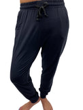 Woman wearing plus size navy joggers