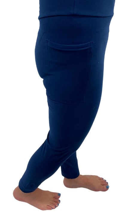 Woman wearing one size navy leggings with pockets