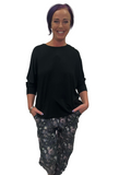 Woman wearing super soft black patterned jogging pants