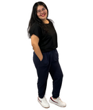 WOMAN WEARING PLUS SIZE NAVY JOGGERS