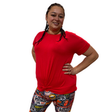 WOMAN WEARING PLUS SIZE RED SHORT SLEEVE TOP