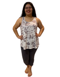 Woman wearing plus size charcoal yoga capris