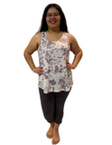 Woman wearing plus size charcoal capris