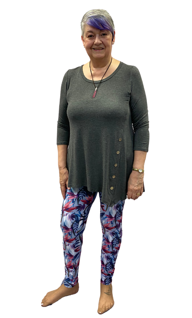 Woman wearing one size navy and burgundy leggings
