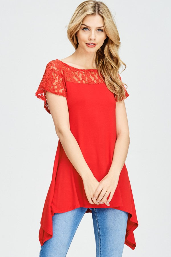 WOMAN WEARING A RED SHORT SLEEVE SHIRT WITH LACE DETAILS
