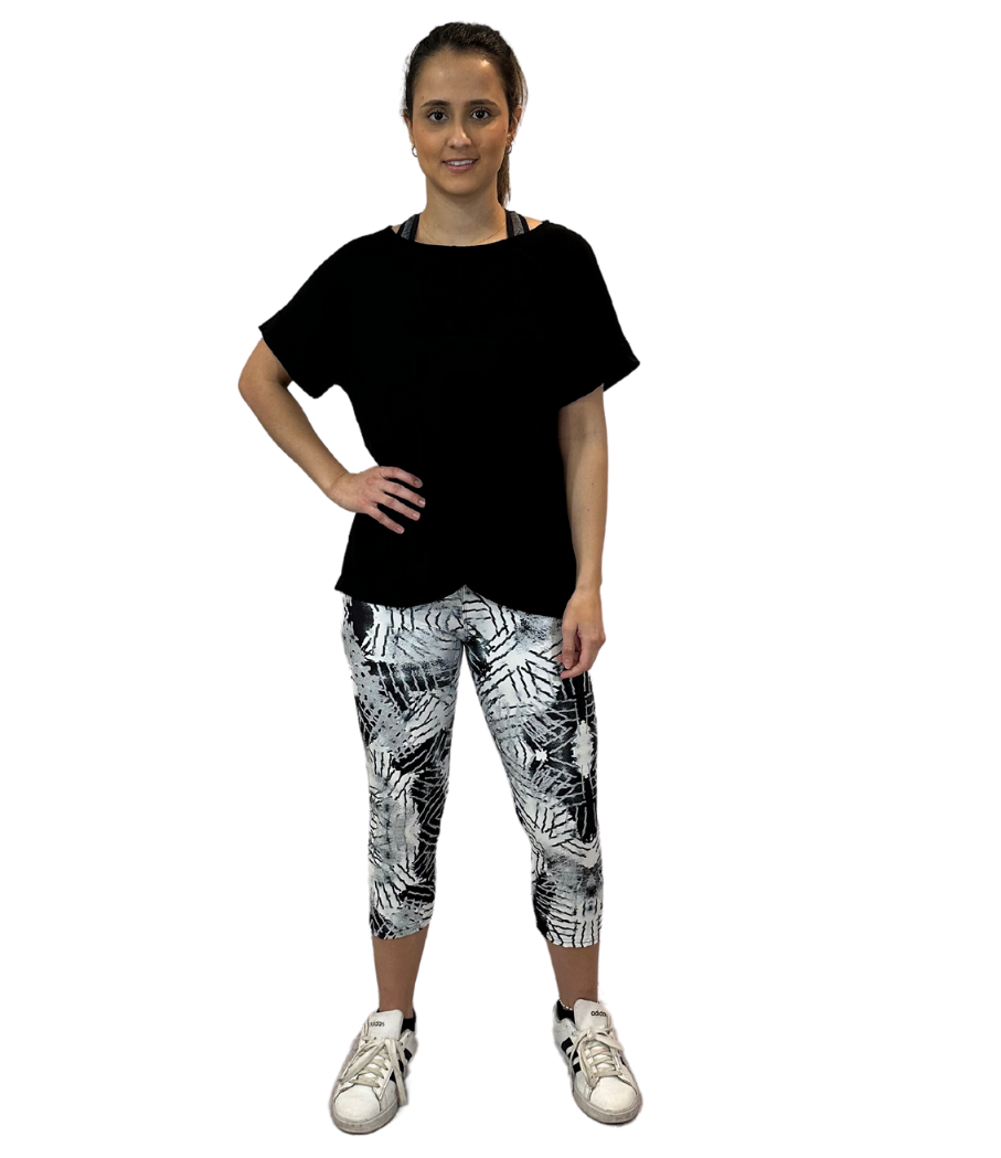 WOMAN WEARING ONE SIZE BLACK AND WHITE CAPRIS