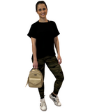 WOMAN WEARING GREEN CAMOUFLAGE LEGGINGS