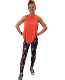 WOMAN WEARING NAVY FLORAL LEGGINGS