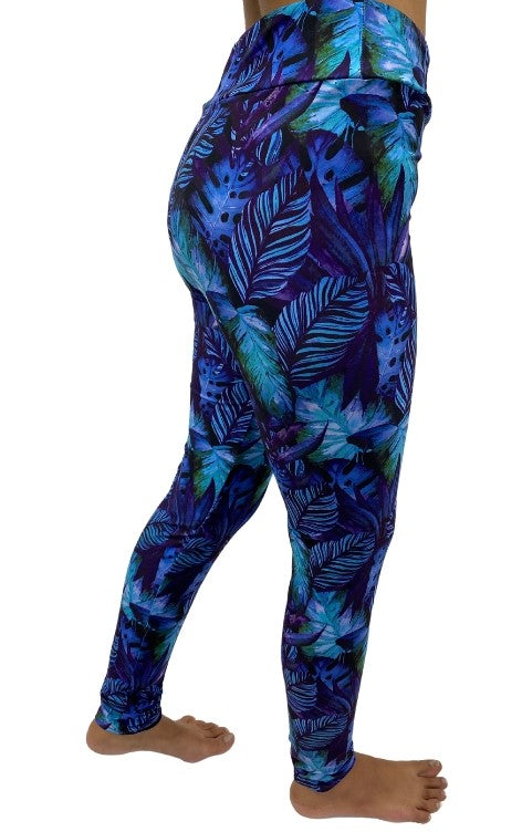 Woman wearing plus size tropical leggings