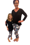MOM AND DAUGHTER WEARING MATCHING UNICORN LEGGINGS