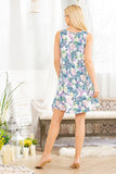 WOMAN WEARING SUMMER DRESS WITH POCKETS