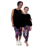 MOM AND TWEEN WEARING MATCHING LEGGINGS
