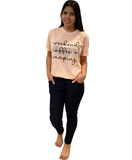 WOMAN WEARING A GRAPHIC T-SHIRT